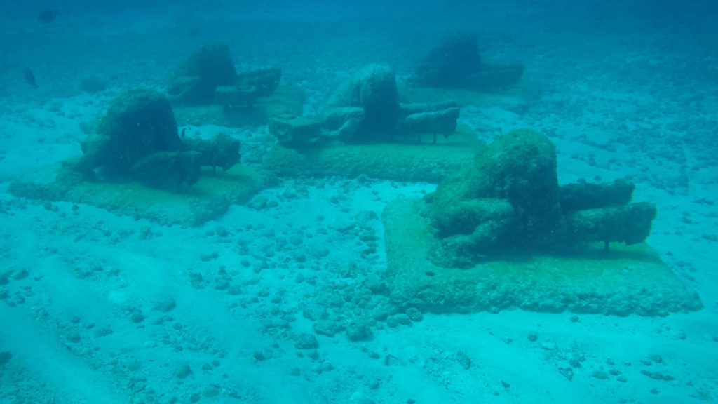 The Banker Sculpture at MUSA Underwater Museum The Banker underwater sculpture at the MUSA Underwater Museum in Cancún
