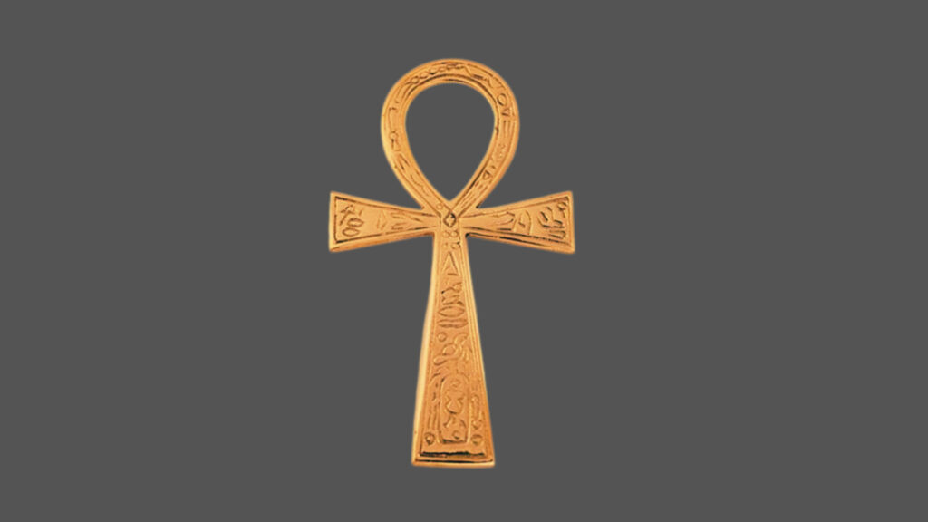 Ancient Egyptian Symbols, a golden ankh with hieroglyphic inscriptions, centered against a dark gray background in a realistic studio shot.