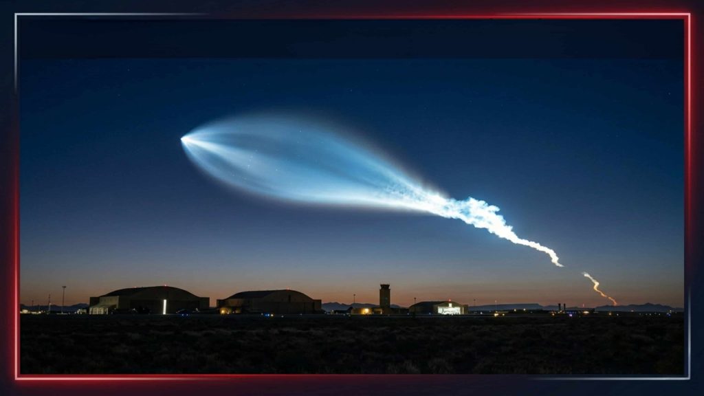 UFO Sighting 2026 shows a rocket like bright white and blue plume lighting the twilight sky above Holloman Air Force Base with glowing fragments and silhouetted hangars below